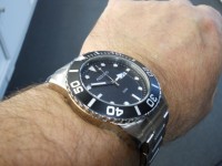 The big Mizano fits snugly on the wrist